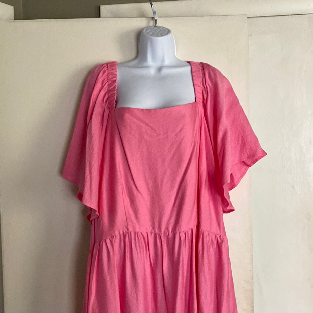 Pink long summery breezy dress. Open back with a tie.